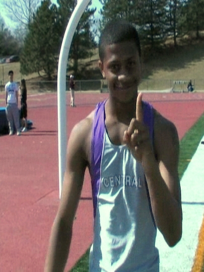 Deverll Biggs flashes No.1 sign after posting Burke Relay best high jump of the meet