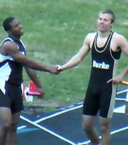 Michael Burrus (leftt) and Jake Marousek:Two future college teammates for the University of South Dakota shake hands after 400 relay event