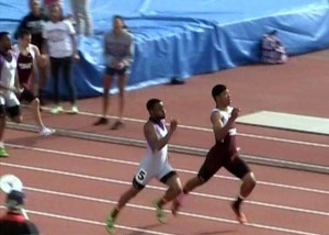 Kenzo Cotton (right) battles Devin Barfield during 200 Meter Finals. 