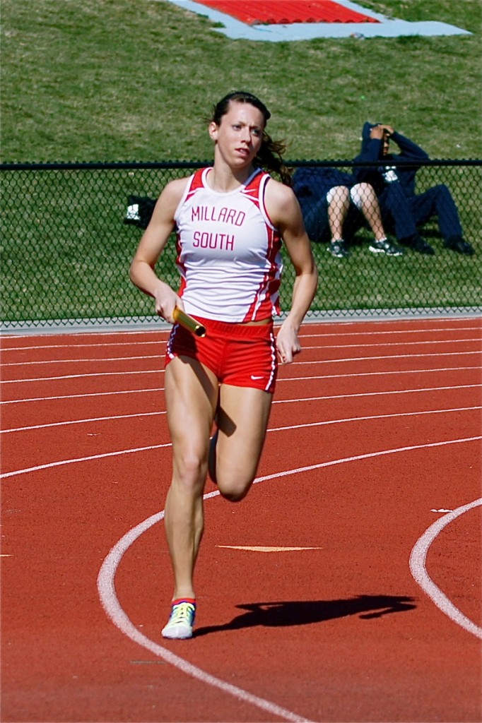 Morgan Woitzel 2010 Girls Class A 800 meter champion running with baton.