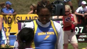 LaQue Moen-Davis talking with teammate at 2011 Nebraska state track meet.