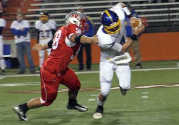 Class of 2014 All-Ohio DT Corey Durbin, on his way to racking up another tackle for a loss, in a game played this past season.