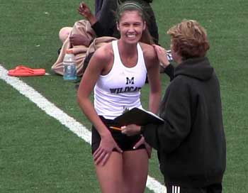 Sidney Hirsch: The Wildcat senior is all smiles, after her PR shattering 3200 meter win at the 2013 Metro Conference Track & Field Championships.